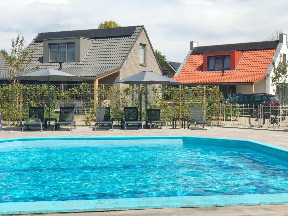 Bungalow 82 Op Recreatiepark De Wielen ซินท์ มาร์เท็น ภายนอก รูปภาพ